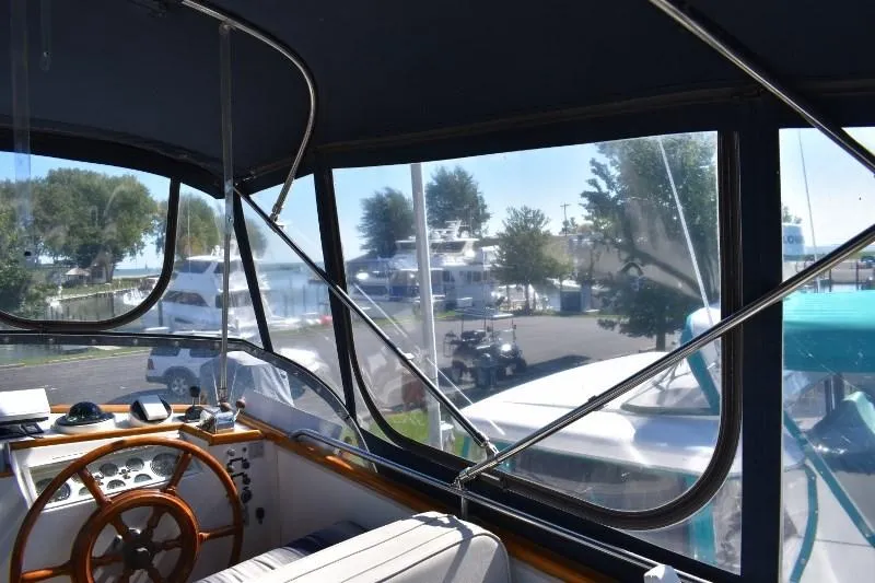Slide: The Image of Interior view of 1985 Grand Banks 49 Motoryacht overlooking the marina. - 47