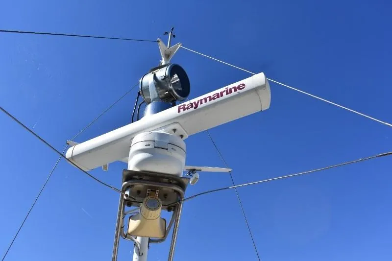 Slide: The Image of Raymarine radar on 1985 Grand Banks 49 Motoryacht against blue sky. - 48