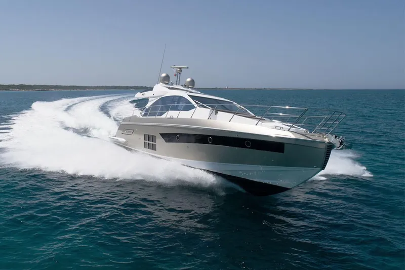 Slide: The Image of 2023 Azimut S6 yacht cruising on open water. - 3