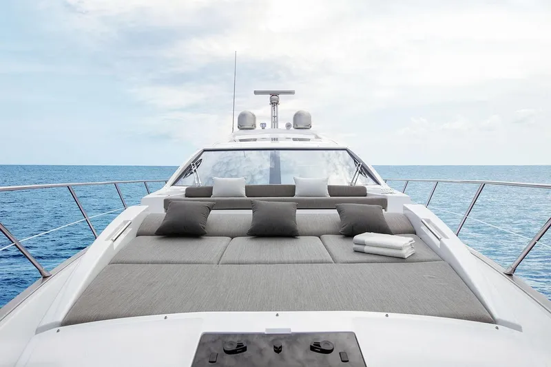 Slide: The Image of 2023 Azimut S6 yacht with luxurious sunbathing area on the open sea. - 5