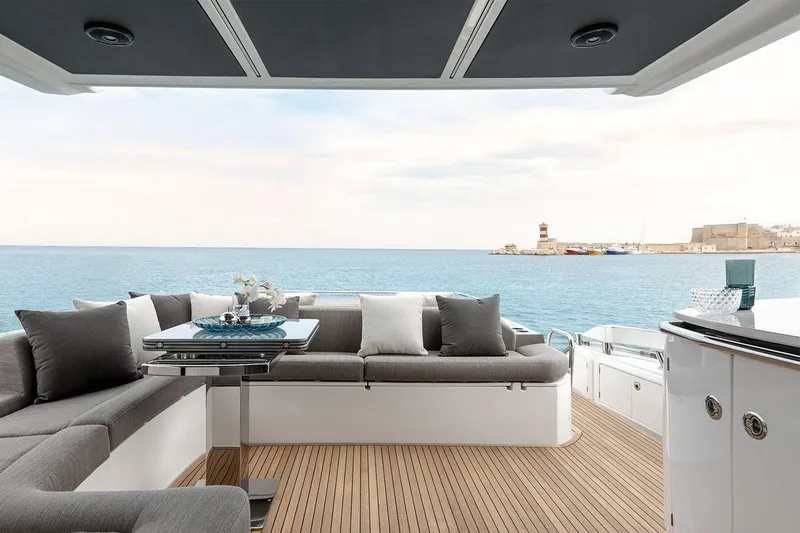 Slide: The Image of Luxury deck of 2023 Azimut S6 yacht with ocean view and comfortable seating. - 6