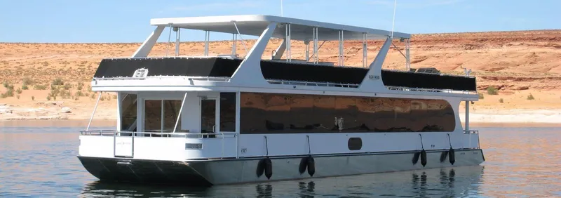 The Image of Bravada houseboat on calm water, Summer Solstice Trip 2012. - 1