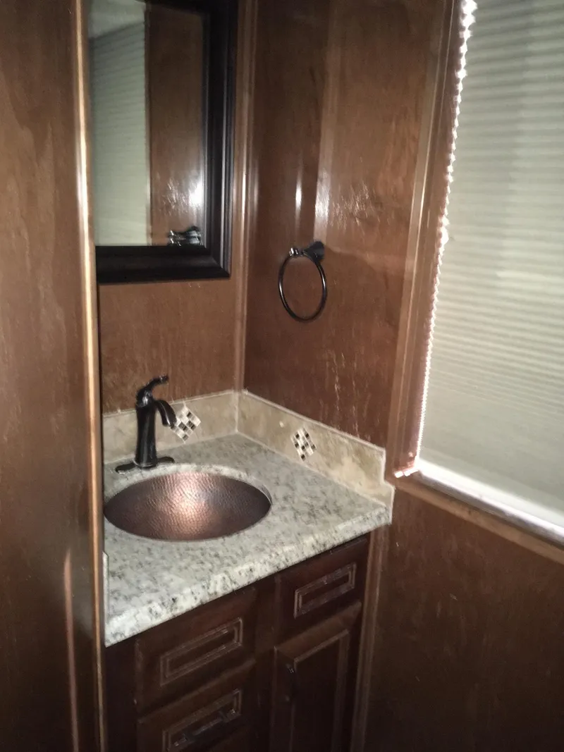 Slide: The Image of Luxurious bathroom in Bravada RV, 2012 model. - 15