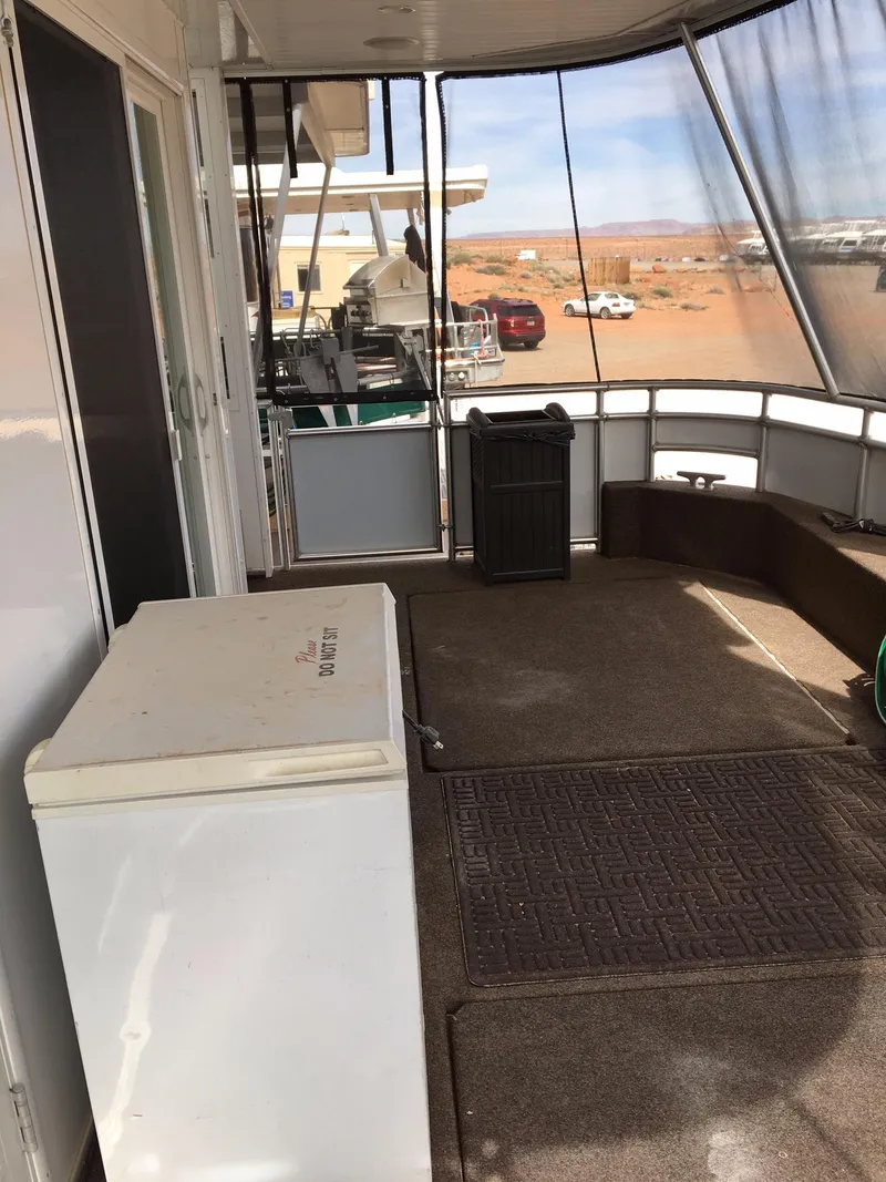 Slide: The Image of Houseboat deck with fridge, carpet, and view, Bravada 2012. - 16