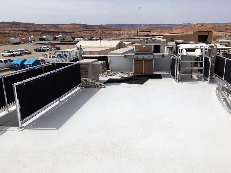 Slide: The Image of Bravada Summer Solstice Trip 2012, rooftop view with desert landscape. - 22
