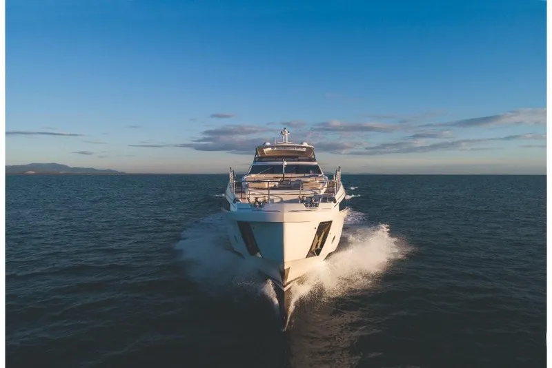 Slide: The Image of 2023 Azimut Grande 32 Metri yacht cruising on open water. - 25
