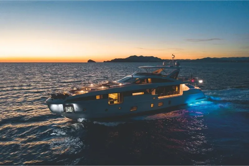 Slide: The Image of 2023 Azimut Grande 32 Metri yacht cruising at sunset. - 27