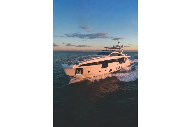 Slide: The Image of 2023 Azimut Grande 32 Metri yacht cruising at sunset. - 29