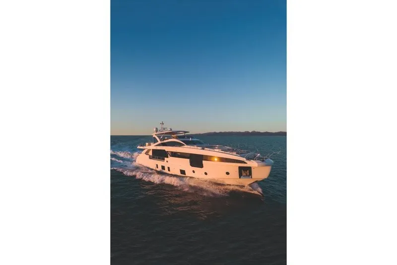 Slide: The Image of 2023 Azimut Grande 32 Metri yacht cruising at sunset. - 30