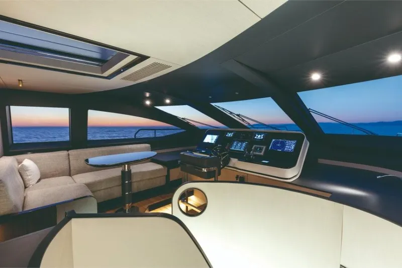 Slide: The Image of Luxurious interior of 2023 Azimut Grande 32 Metri yacht at sunset. - 32