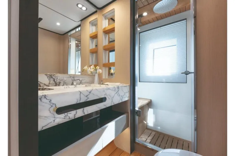 Slide: The Image of Luxurious bathroom in 2023 Azimut Grande 32 Metri yacht with marble sink and modern shower. - 33
