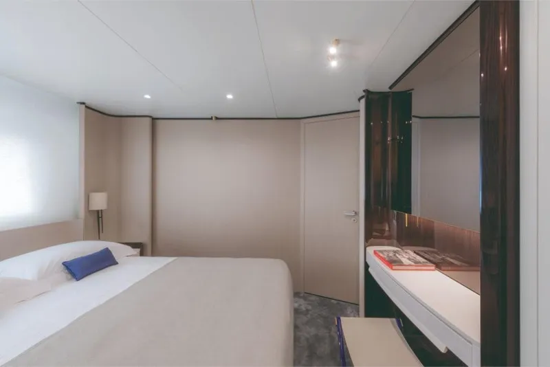 Slide: The Image of Luxurious bedroom interior of 2023 Azimut Grande 32 Metri yacht with modern furnishings. - 35