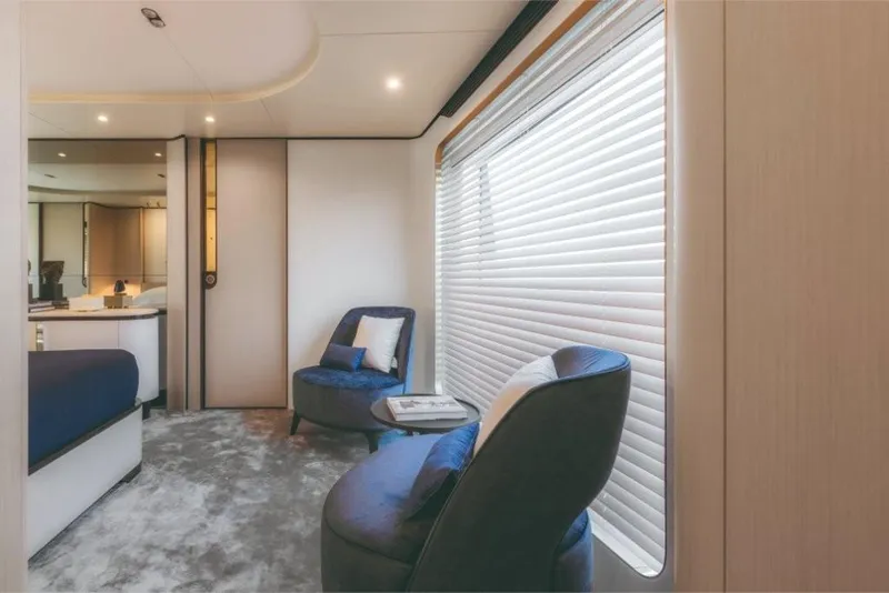 Slide: The Image of Luxurious interior of 2023 Azimut Grande 32 Metri yacht with modern seating area. - 45