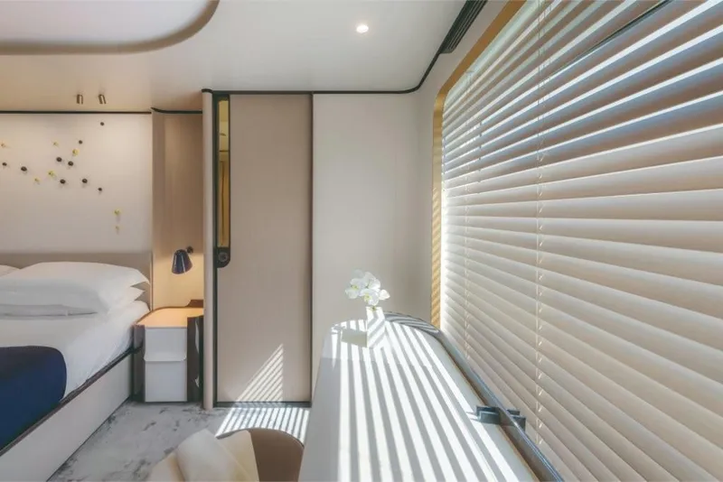 Slide: The Image of Luxurious bedroom interior of 2023 Azimut Grande 32 Metri yacht with modern decor. - 46