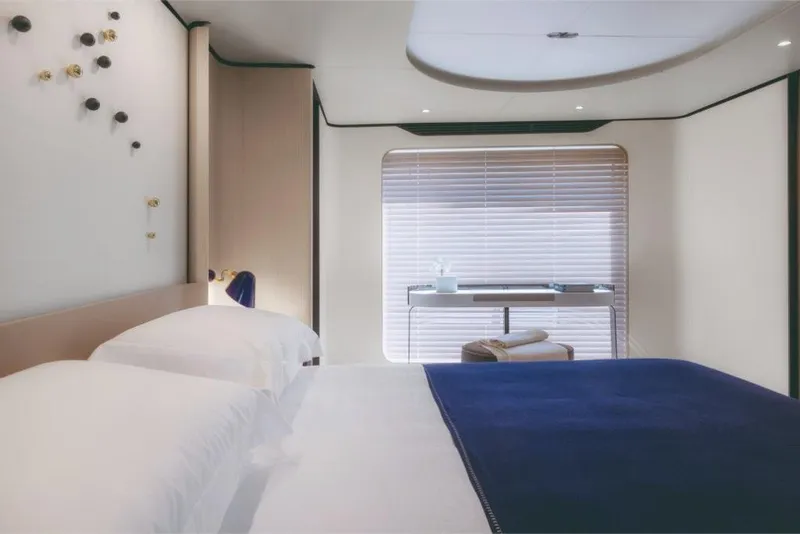 Slide: The Image of Luxurious bedroom interior of 2023 Azimut Grande 32 Metri yacht with modern decor. - 48