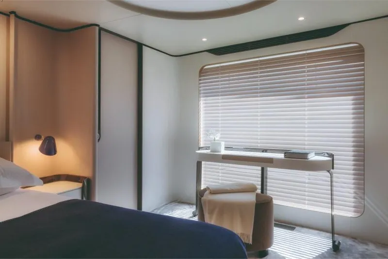 Slide: The Image of Luxurious bedroom interior of 2023 Azimut Grande 32 Metri yacht with modern furnishings. - 49