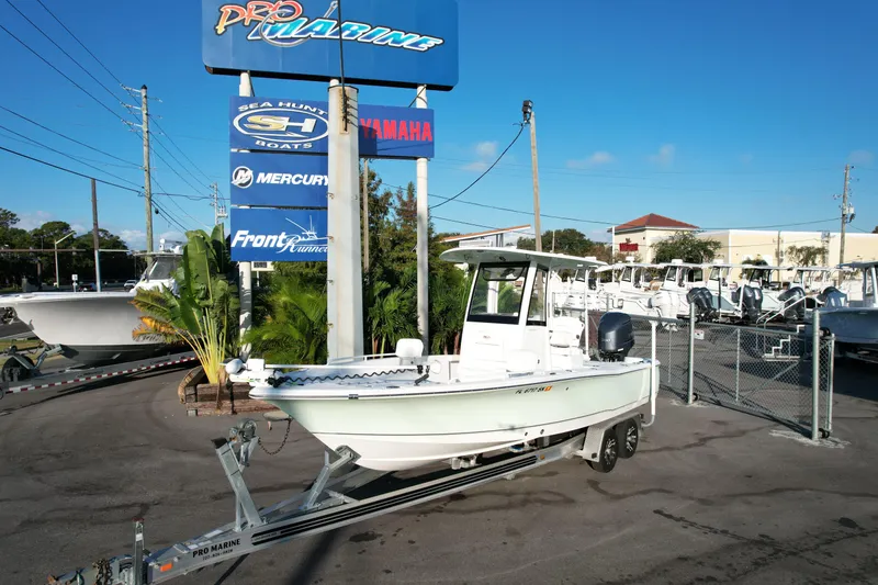 Slide: The Image of 2019 Sea Hunt BX 25 FS boat on trailer at Pro Marine dealership. - 23