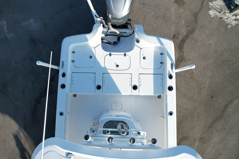 Slide: The Image of Overhead view of 2019 Sea Hunt BX 25 FS boat deck with storage compartments. - 5