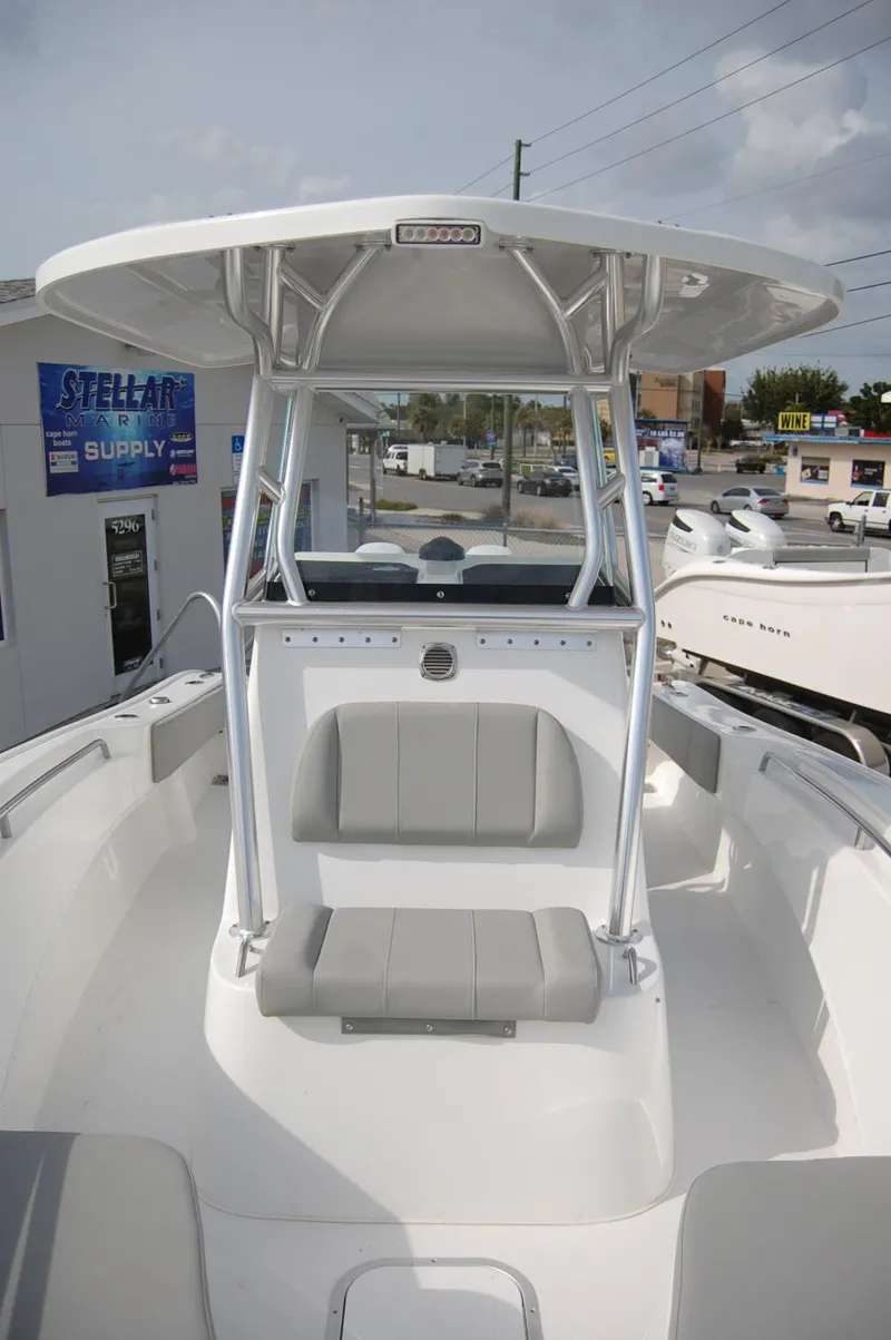 Slide: The Image of 2024 Cape Horn 24 XS boat with T-top and seating. - 11