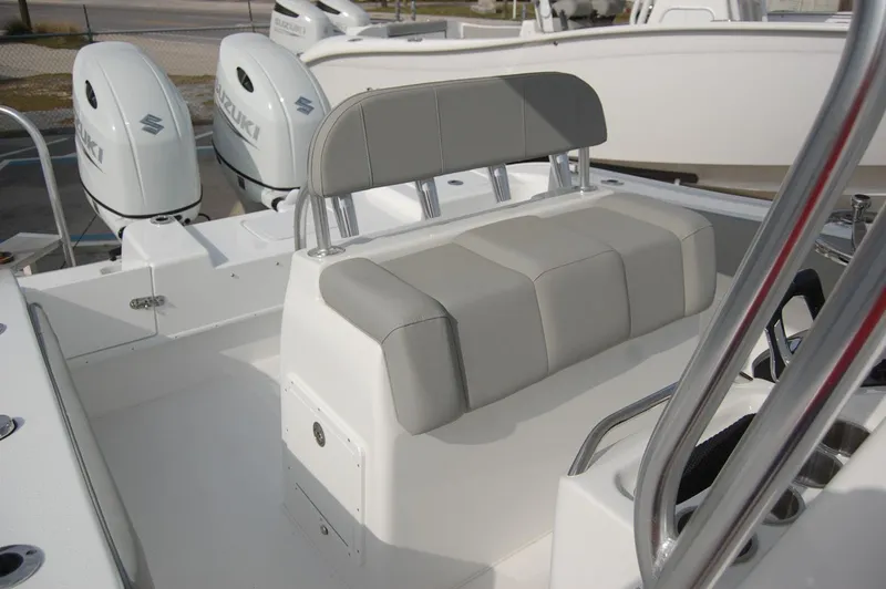 Slide: The Image of 2024 Cape Horn 24 XS boat interior with dual Suzuki outboard engines. - 14