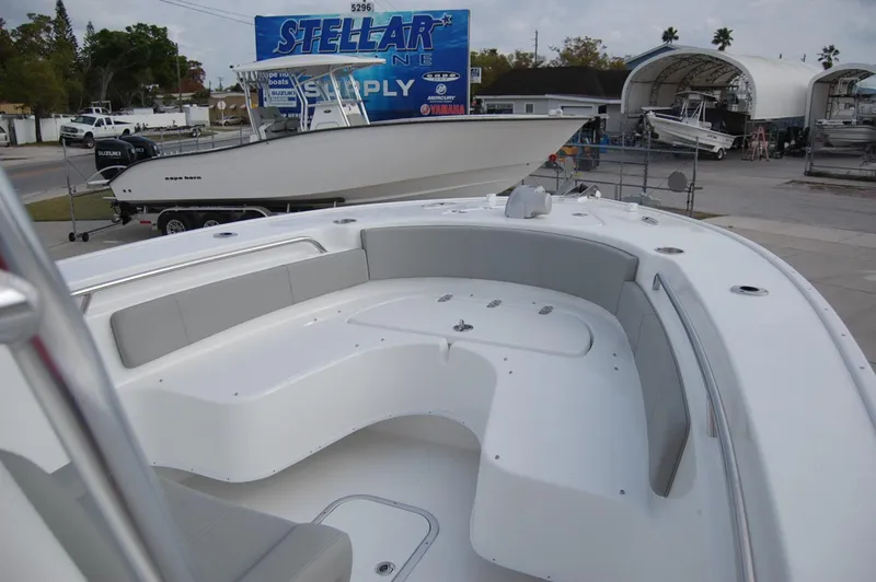 Slide: The Image of 2024 Cape Horn 24 XS boat with spacious seating and modern design. - 8