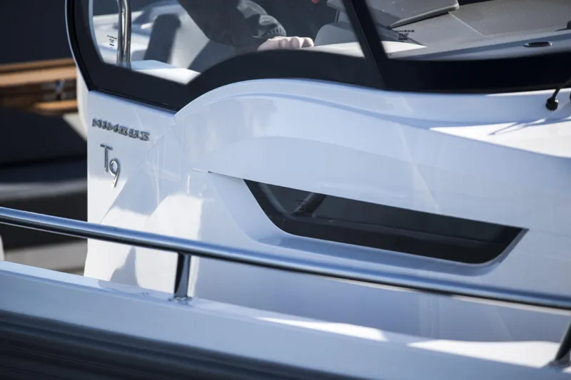 Slide: The Image of 2025 Nimbus T9 boat close-up, sleek white exterior design. - 5