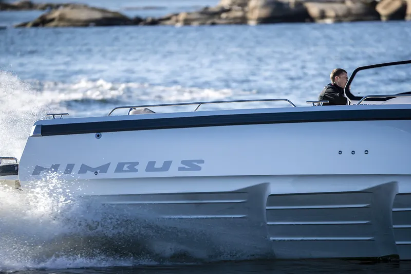 Slide: The Image of Nimbus T9 2025 motorboat cruising on a sunny day. - 7