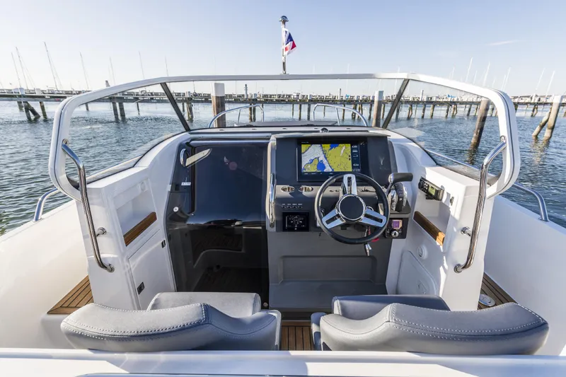 Slide: The Image of Interior view of 2025 Nimbus T9 boat cockpit with navigation system. - 3
