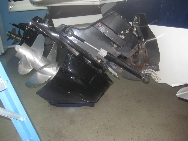 Slide: The Image of Close-up of a boat propeller and drive system on a 2013 Sea Ray 260 Sundeck. - 23
