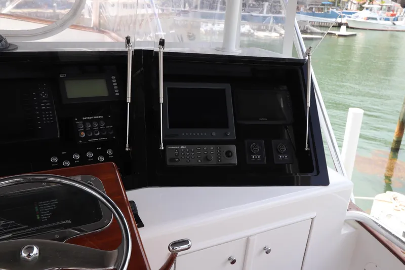 Slide: The Image of Control panel of a 2002 Buddy Davis 74 yacht with navigation equipment. - 45