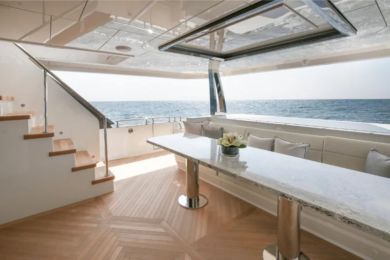 Slide: The Image of Luxurious Ocean Alexander 30R 2023 yacht interior with ocean view, modern seating, and elegant design. - 25