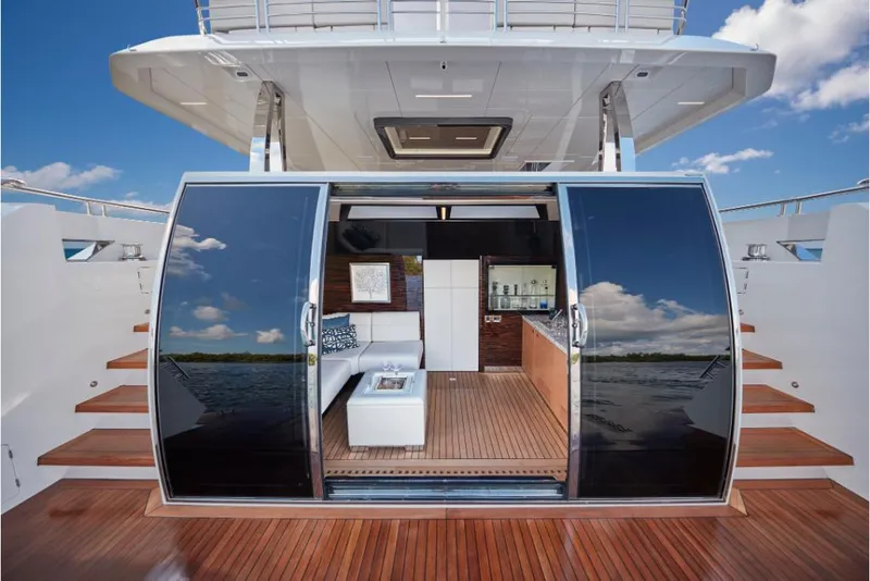 Slide: The Image of Luxury interior of 2023 Ocean Alexander 30R yacht with sliding glass doors. - 26