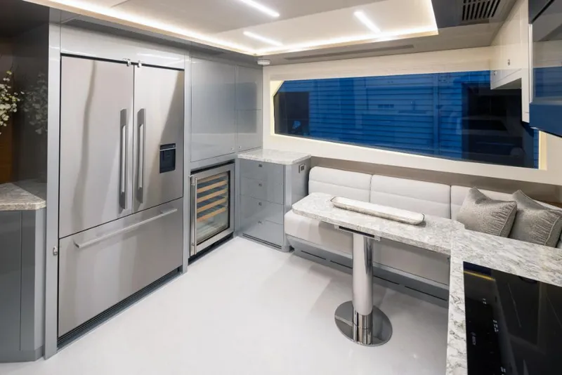Slide: The Image of Modern kitchen interior of 2023 Ocean Alexander 30R yacht with stainless steel appliances. - 28