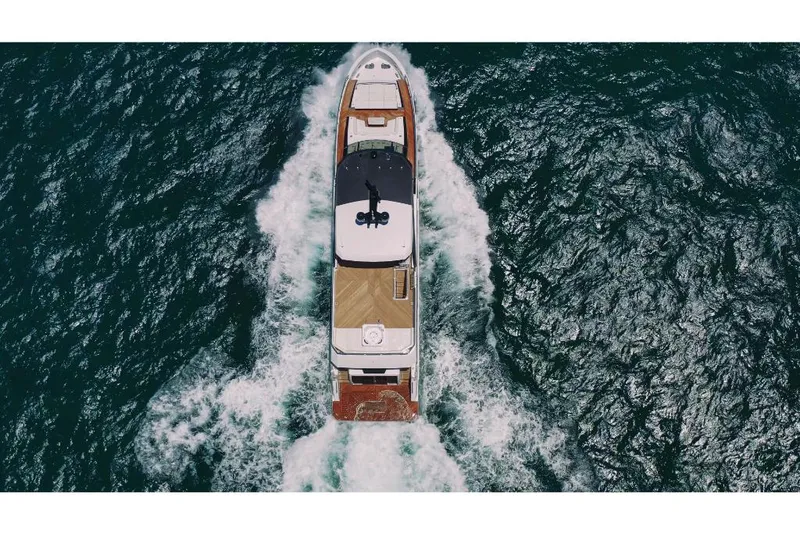 Slide: The Image of Aerial view of 2023 Ocean Alexander 30R yacht cruising on the ocean. - 3