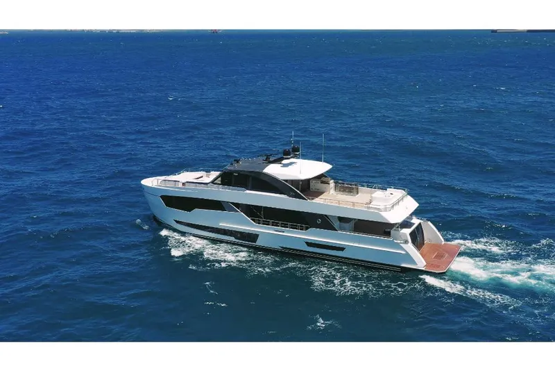 Slide: The Image of 2023 Ocean Alexander 30R yacht cruising on open blue sea. - 5