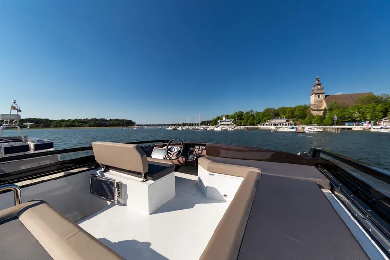Slide: The Image of Galeon 470 Sky 2023 yacht on a scenic river with clear blue sky. - 15