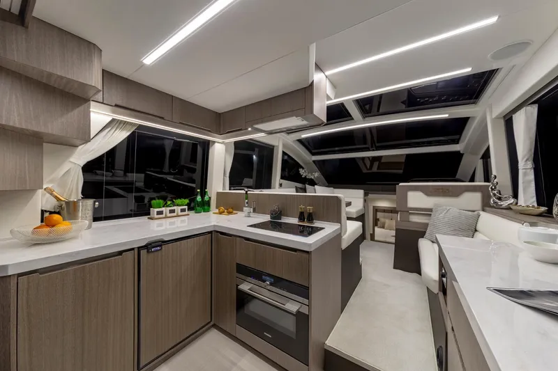 Slide: The Image of Modern kitchen and dining area in 2023 Galeon 470 Sky yacht. - 19