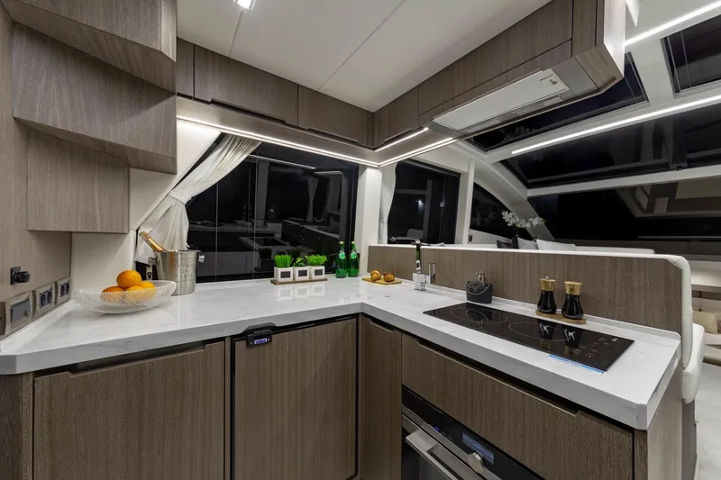 Slide: The Image of Modern kitchen interior of 2023 Galeon 470 Sky yacht with sleek design and appliances. - 21