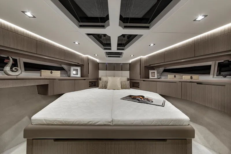 Slide: The Image of Luxurious bedroom interior of 2023 Galeon 470 Sky yacht with modern design and ambient lighting. - 27