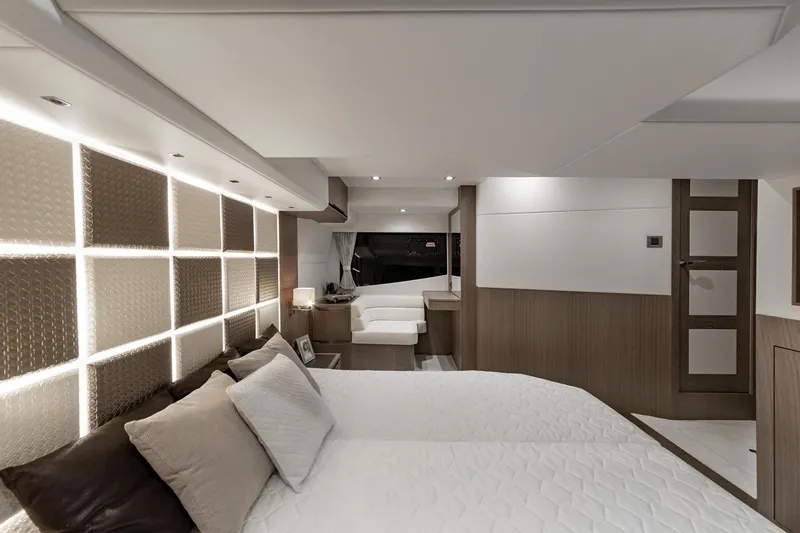 Slide: The Image of Luxurious bedroom interior of 2023 Galeon 470 Sky yacht with modern design and ambient lighting. - 29