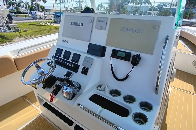 Slide: The Image of 2019 Cape Horn 36XS boat helm with Simrad electronics and steering wheel. - 5