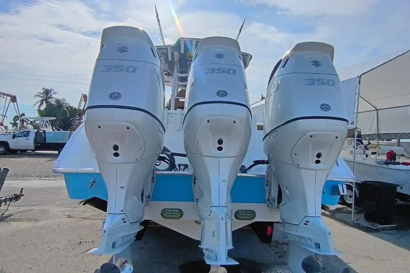 Slide: The Image of 2019 Cape Horn 36XS boat with triple Suzuki 350 outboard engines. - 1