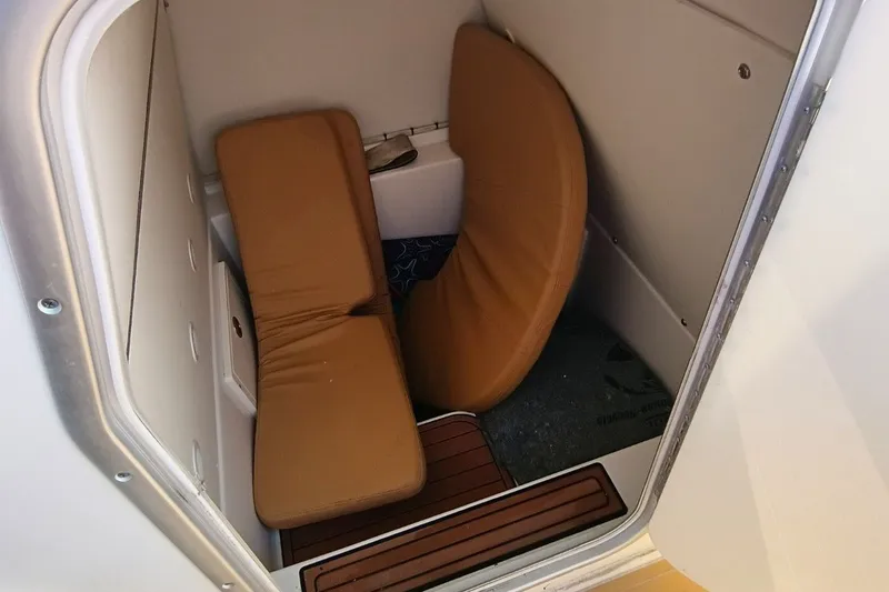 Slide: The Image of Interior cabin of 2019 Cape Horn 36XS boat with brown cushions. - 7