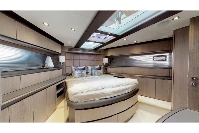 Slide: The Image of Luxurious bedroom interior of 2023 Galeon 650 Sky yacht with modern design and skylight. - 11