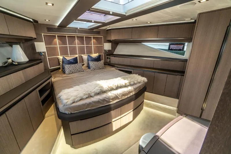 Slide: The Image of Luxurious bedroom interior of 2023 Galeon 650 Sky yacht with modern design. - 12