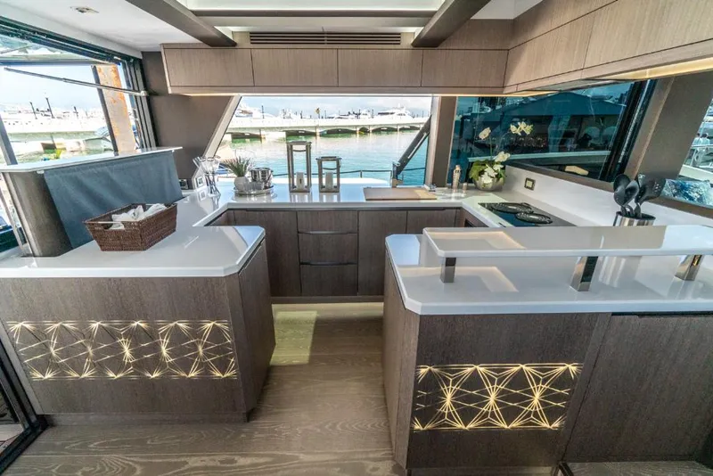Slide: The Image of Modern kitchen interior on the 2023 Galeon 650 Sky yacht. - 4
