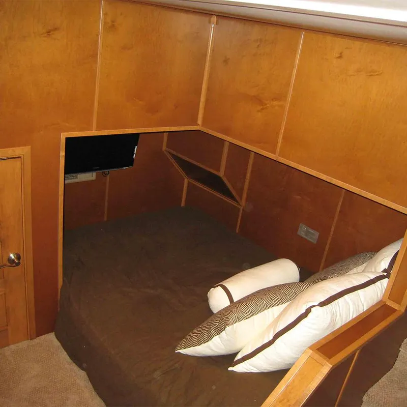 Slide: The Image of Luxurious kitchen in 2012 Bravada Helios Trip #7 with modern appliances and bar seating. - 18