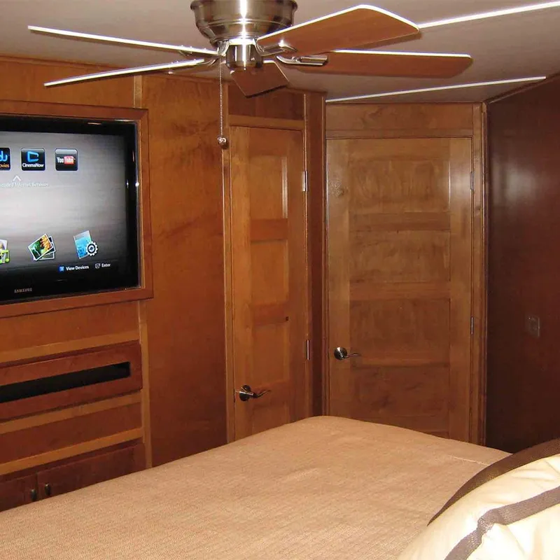 Slide: The Image of Luxurious bedroom in 2012 Bravada Helios Trip #7 with king-size bed and modern decor. - 3