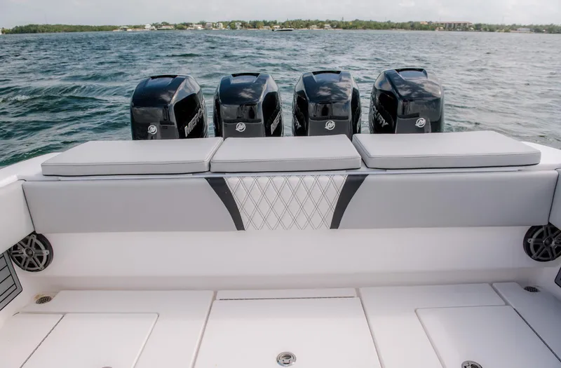 Slide: The Image of 2025 Contender 39 Fisharound boat with quad Mercury outboard engines. - 12
