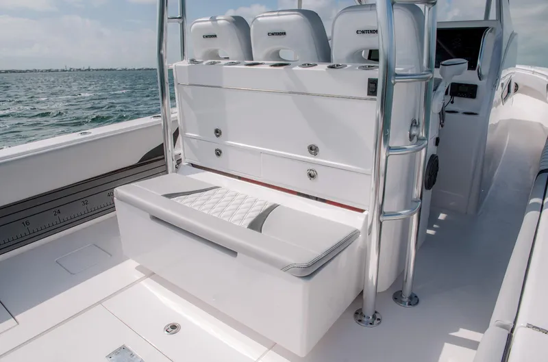 Slide: The Image of 2025 Contender 39 Fisharound boat interior with seating and storage. - 18
